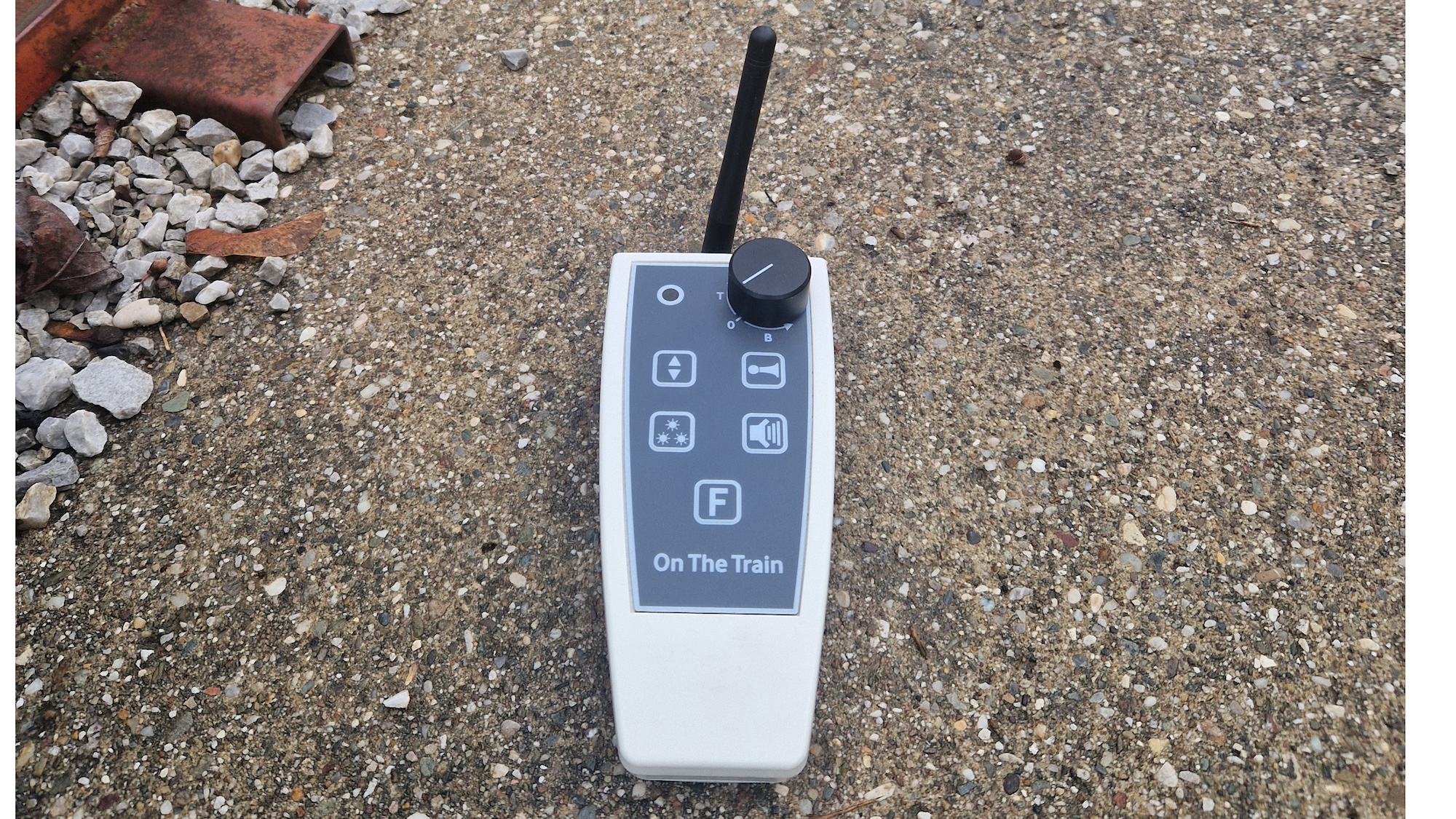 Remote control device on a gravel surface